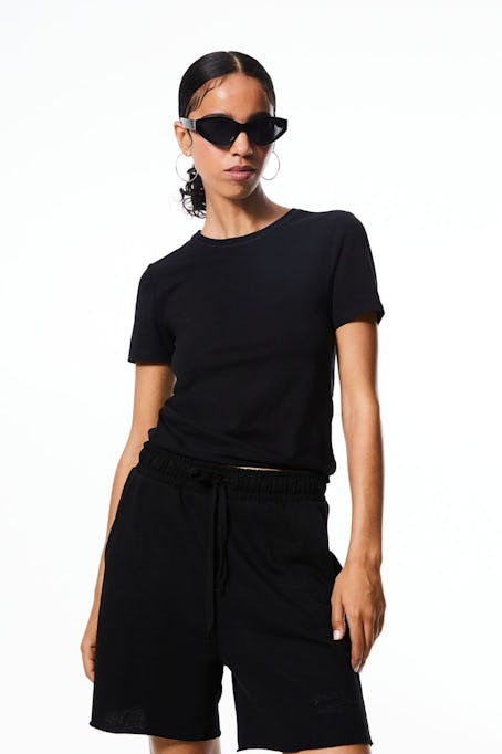 This black tee is like the one Taylor Swift wore to watch football. 
