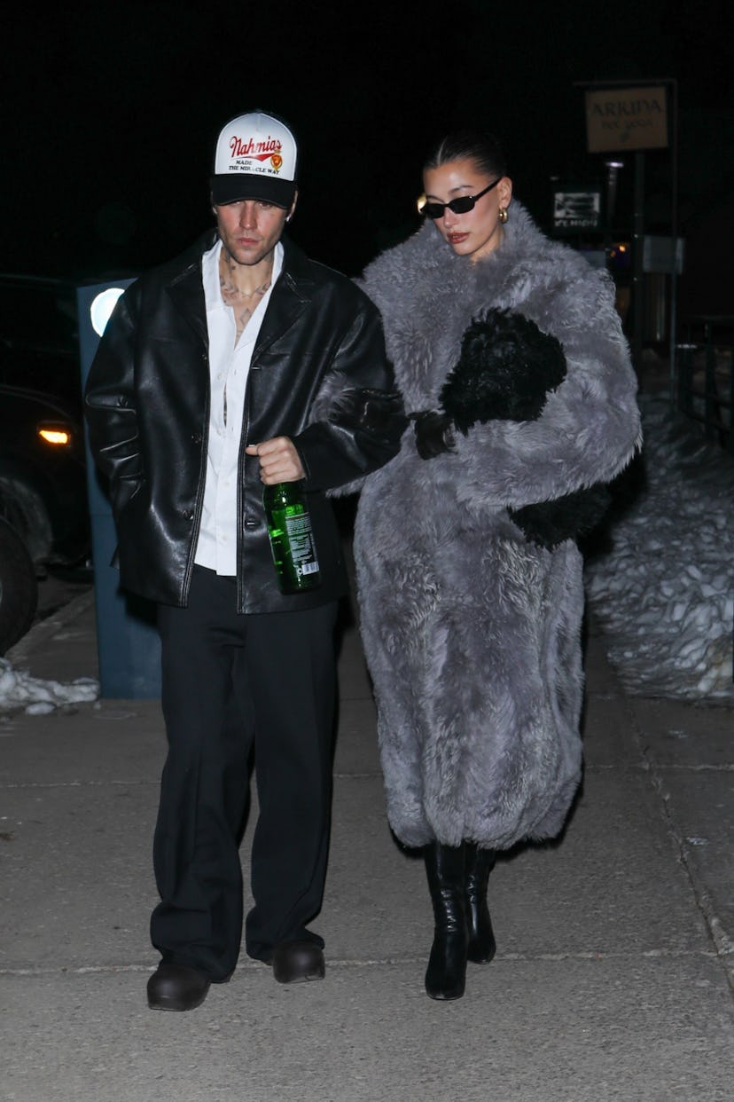 Hailey Bieber wears a gray Ferragamo fur coat in Aspen, Colorado