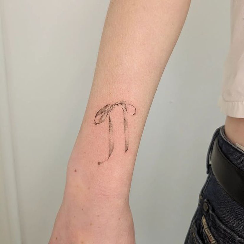 Simple ribbon tattoo.
