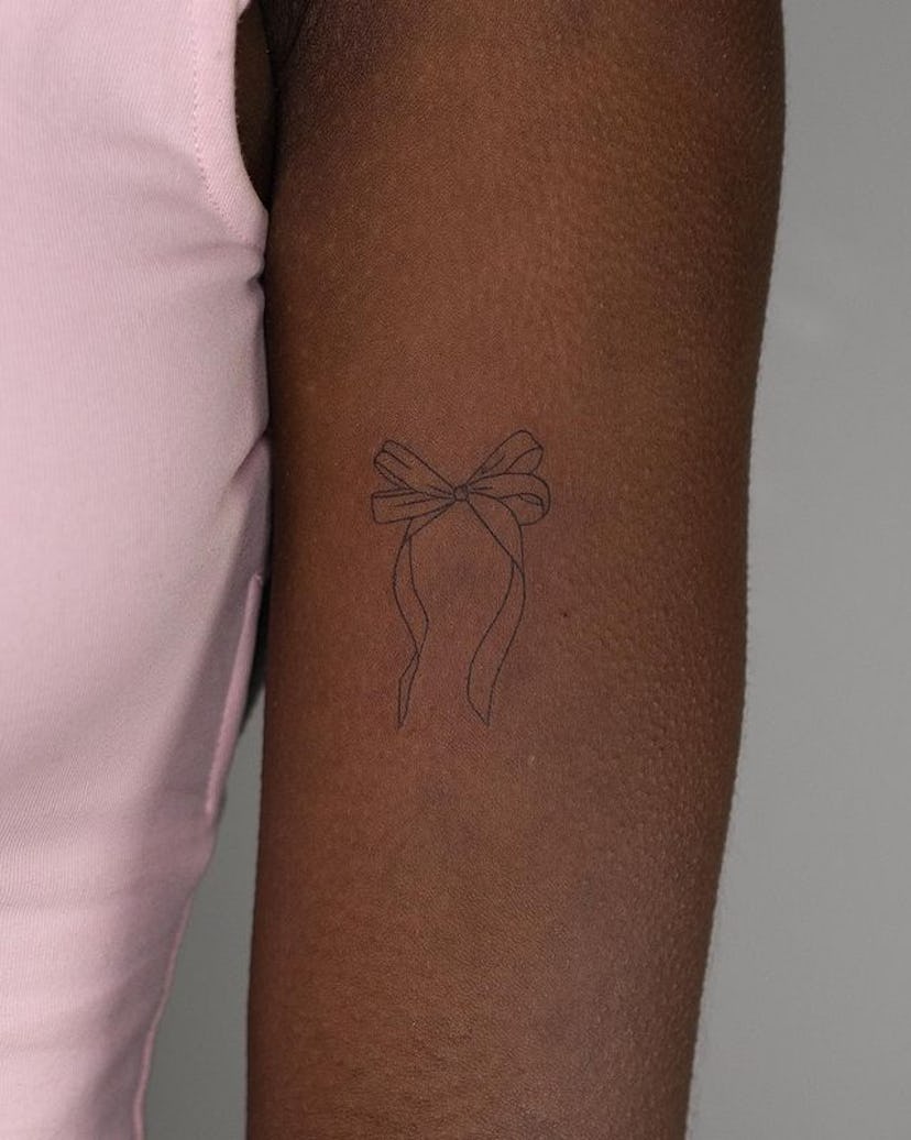 Simple ribbon tattoo.