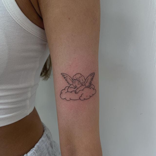 Cherub tattoo.