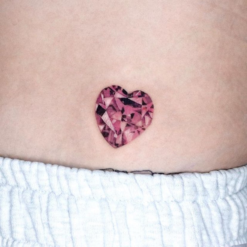 Jewel heart tattoo.