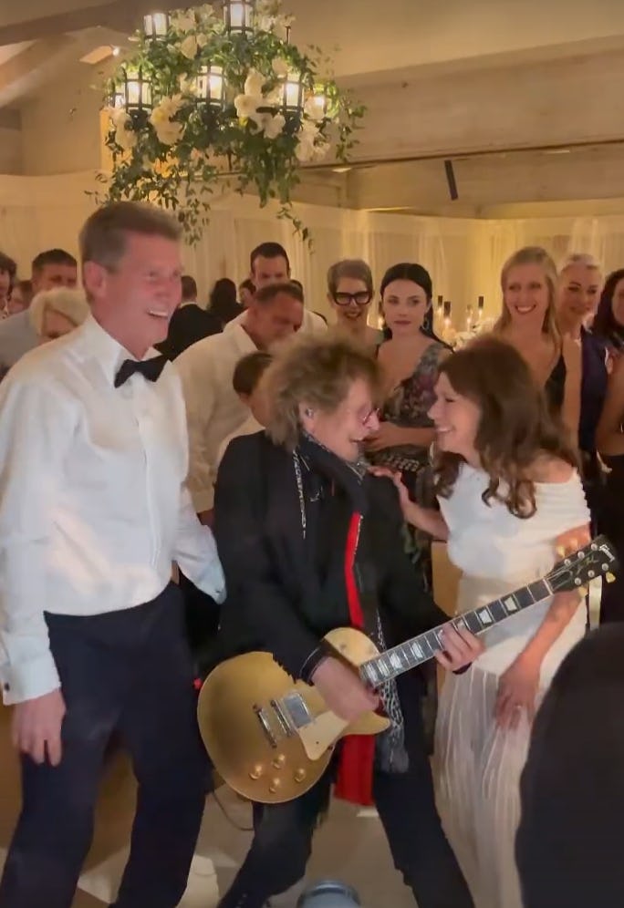 Gerry and Theresa playing guitar at their &lsquo;Golden Wedding&rsquo; reception. Screenshot via Instagram