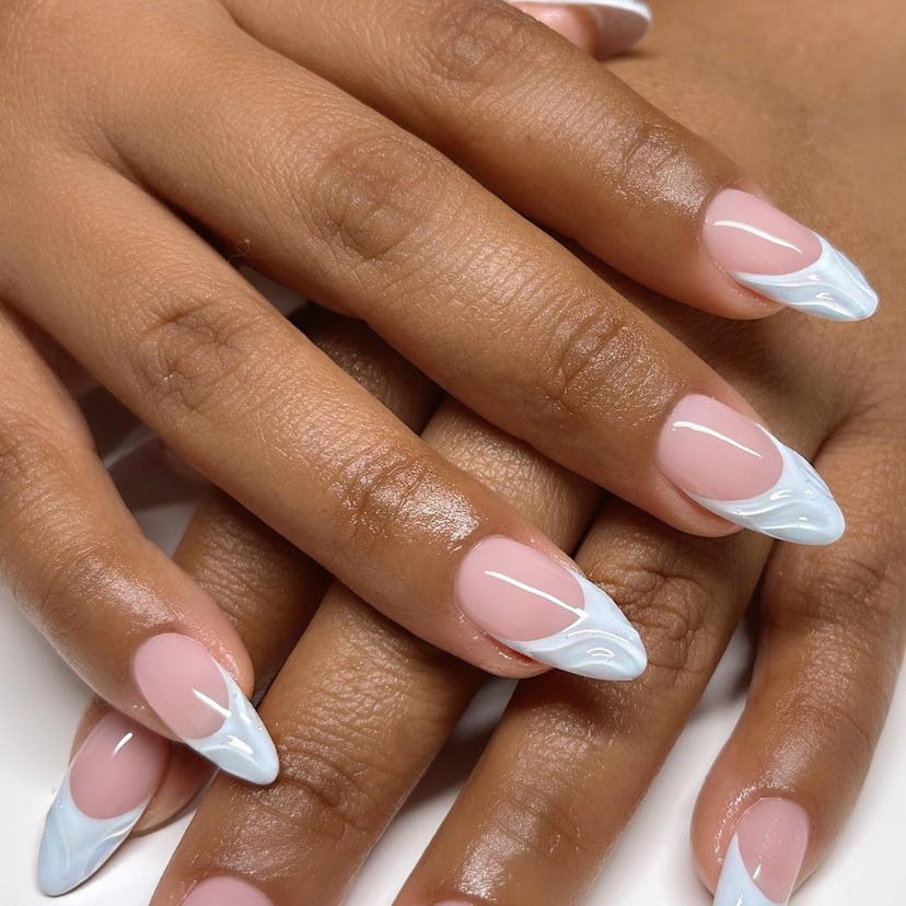 3D textured French tips are a trendy French manicure idea for 2024.