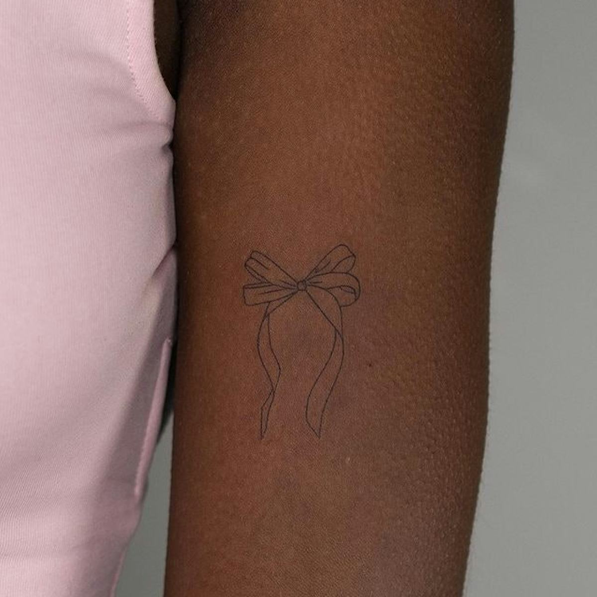 Tattoos of Ribbons and Bows: Sweet & Elegant