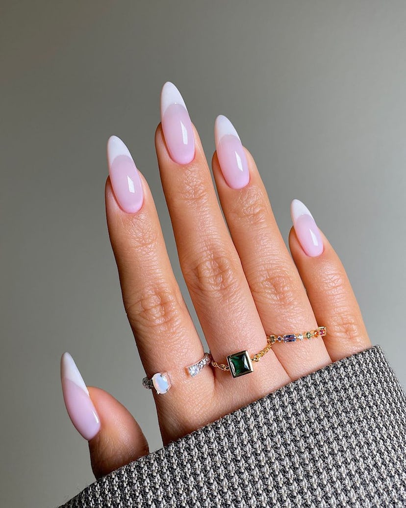 Vanilla French tips are a trendy French manicure idea for 2024.