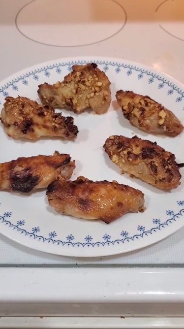 A unique chicken wings recipe for game day are these peanut butter and jelly chicken wings from TikT...