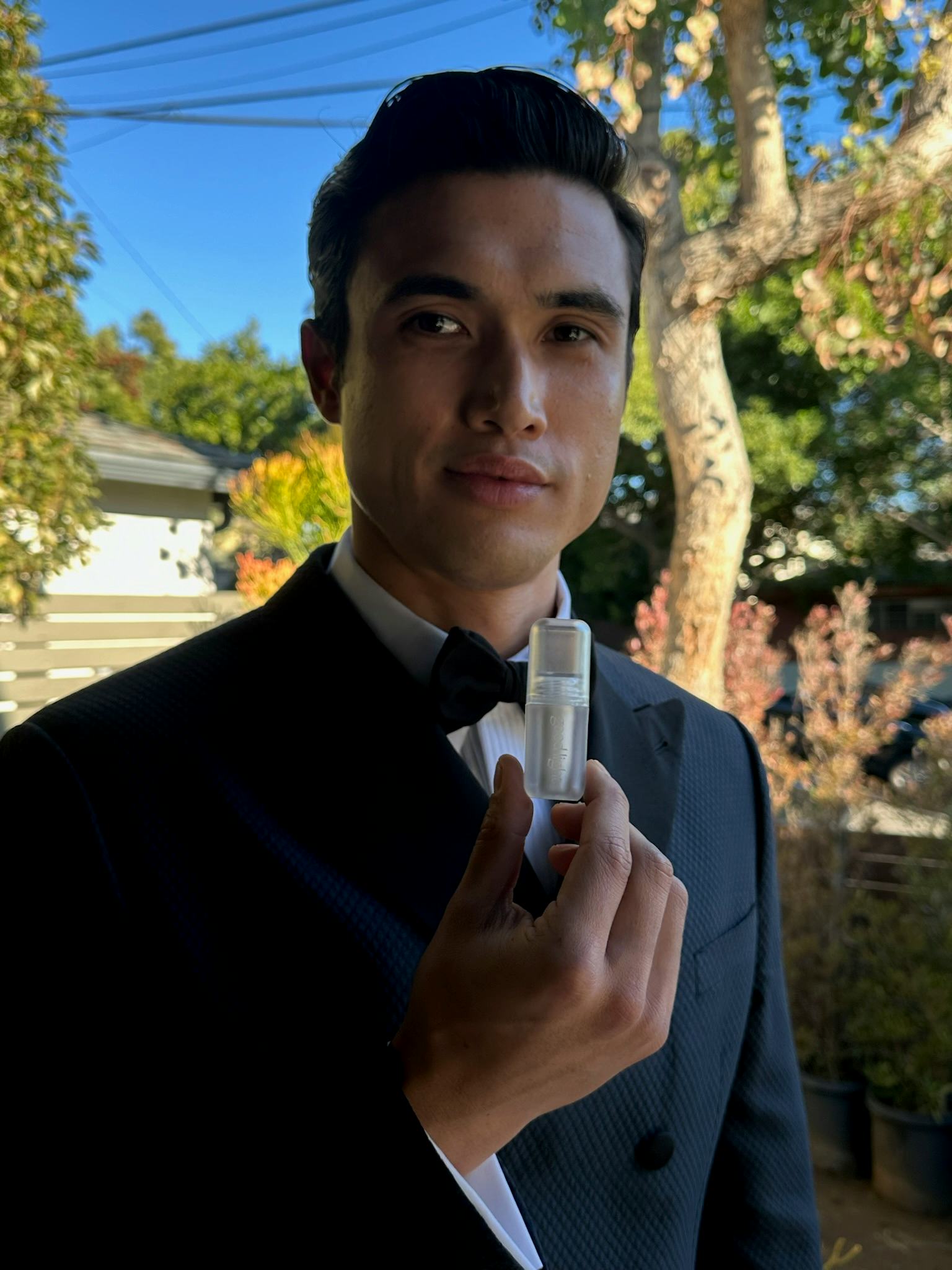 Charles Melton with good light cosmetics' Lip Milk