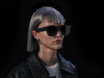 Xreal's Air 2 Ultra augmented reality smart glasses on a woman