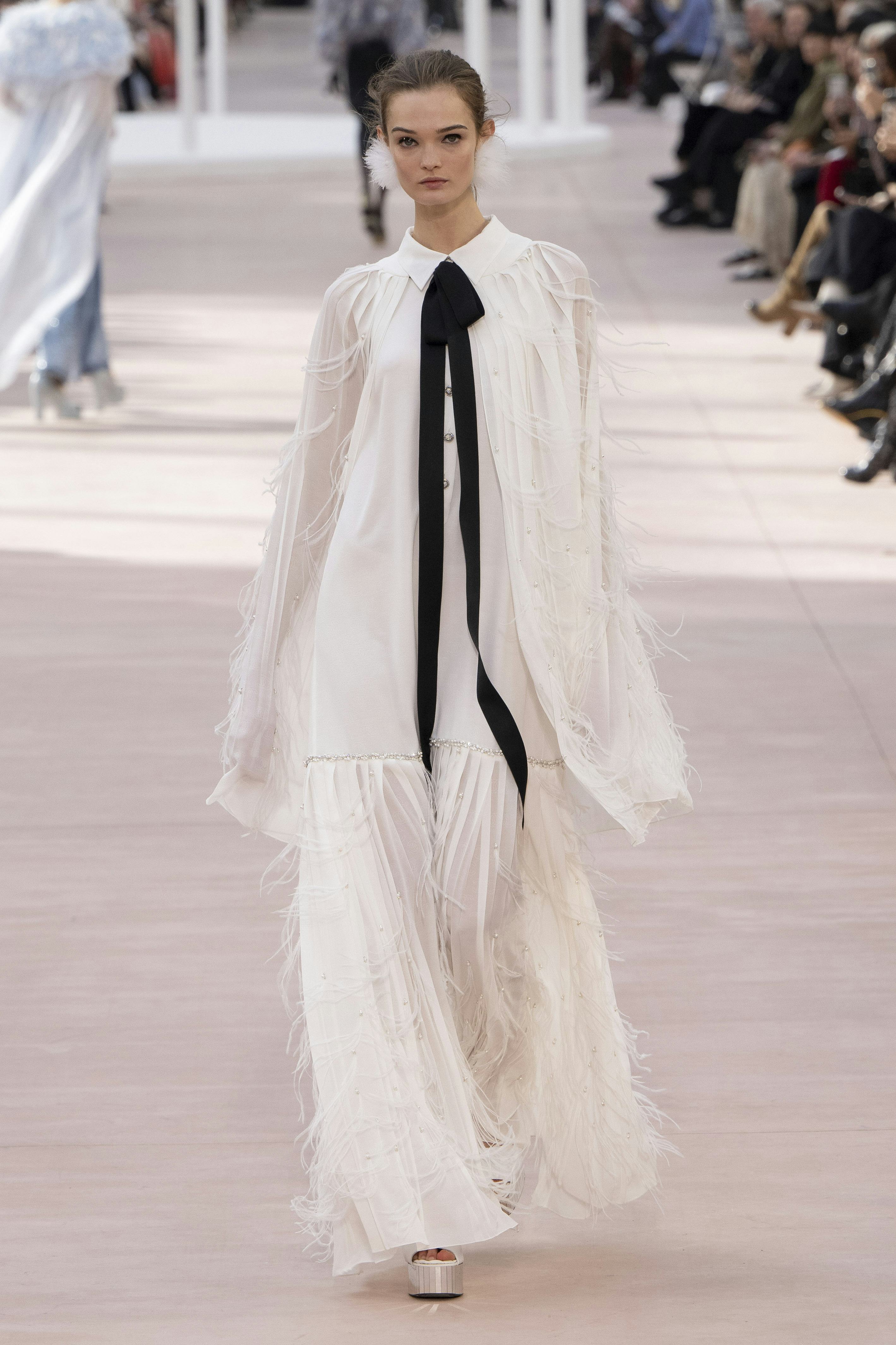 A model walks the runway during the Chanel Ready to Wear Spring/Summer 2025 fashion show as part of ...