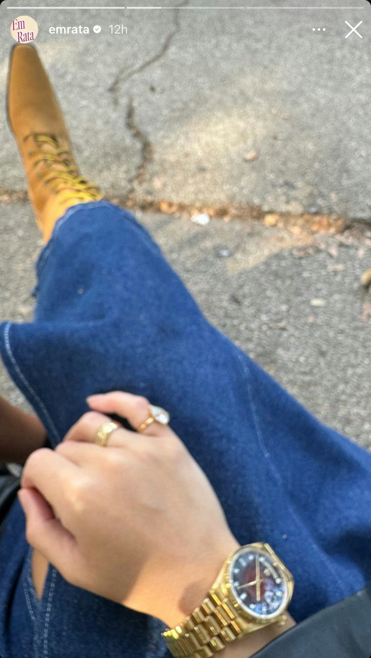 Emily Ratajkowski wore a denim maxi skirt and mustard boots.
