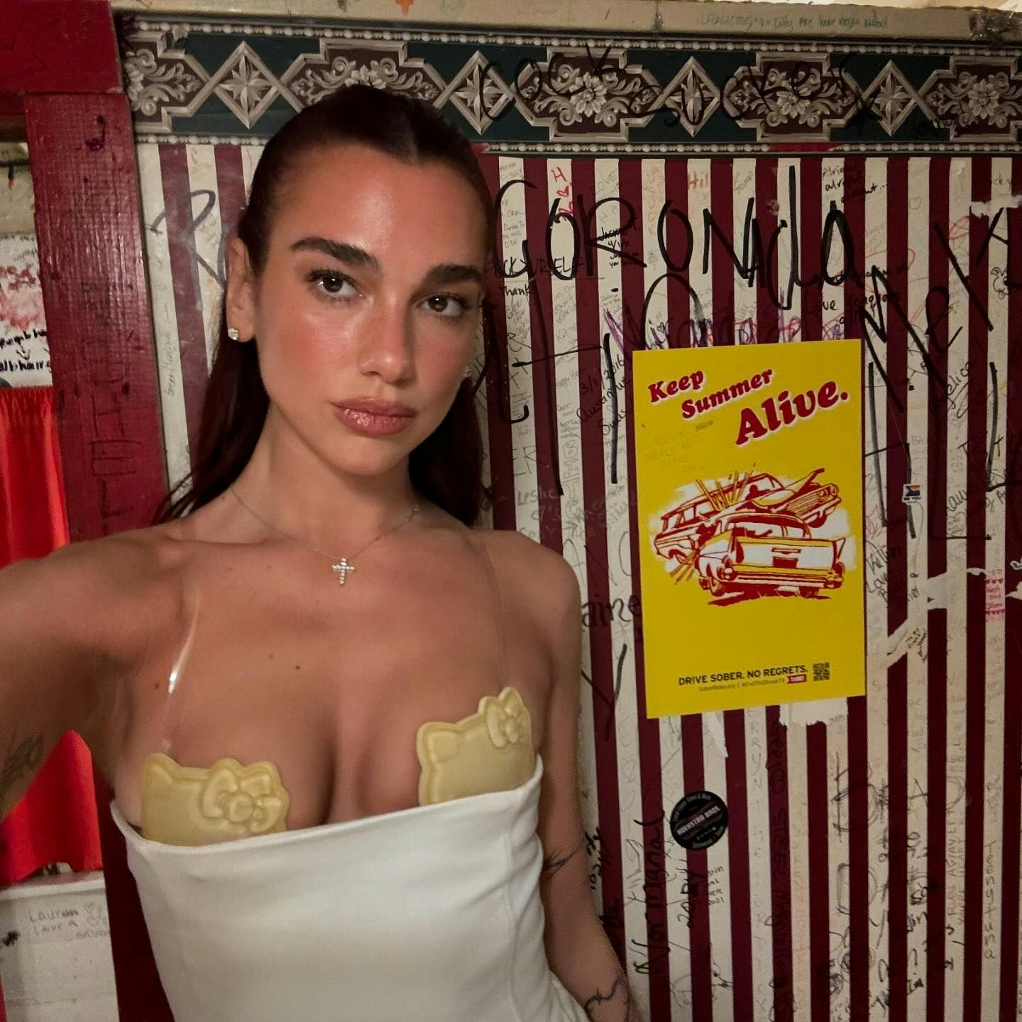 Dua Lipa wore Hello Kitty nipple pasties as a bra.