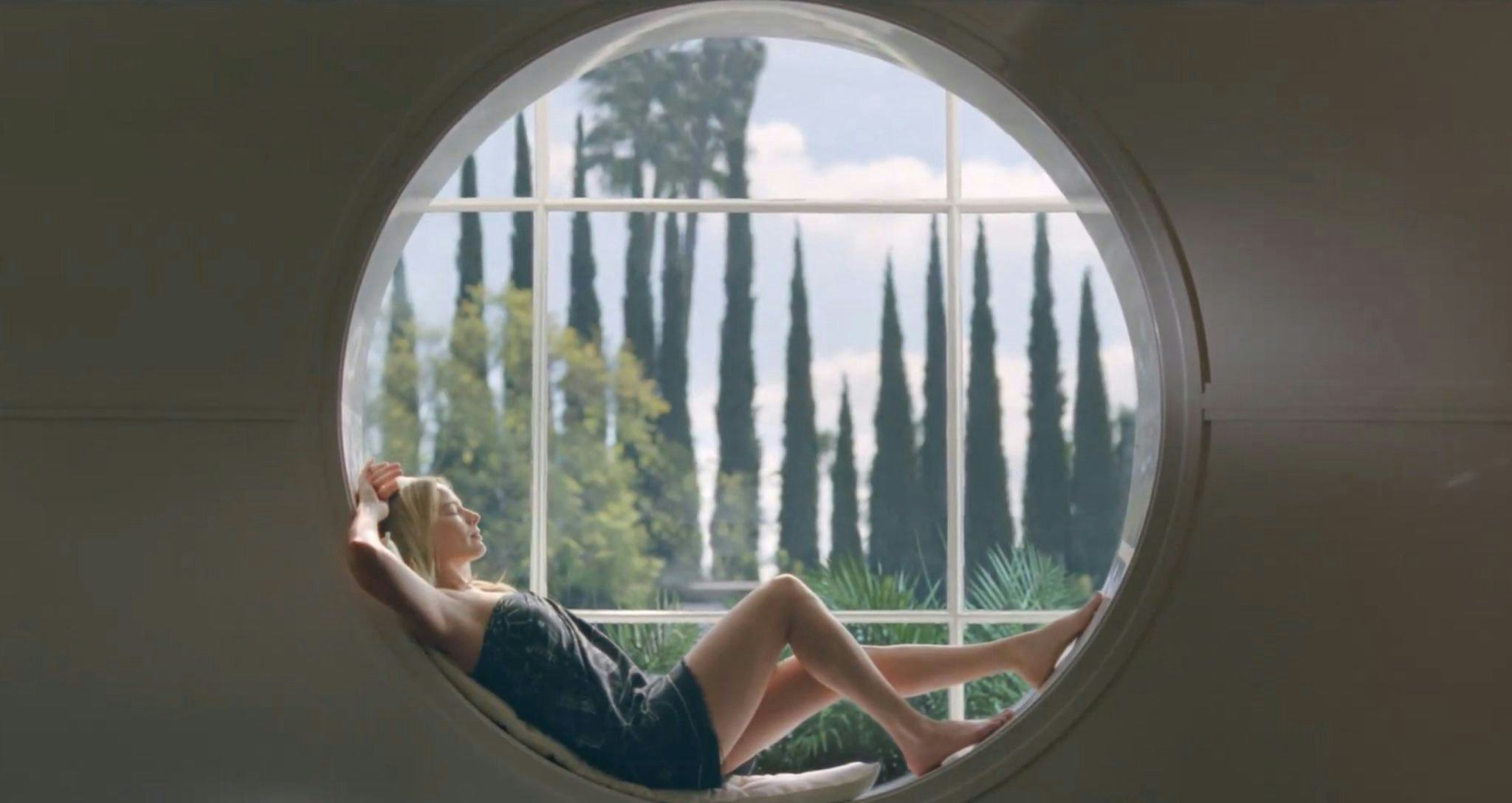 Margot Robbie wears a scarf in Chanel No. 5&rsquo;s new campaign video.