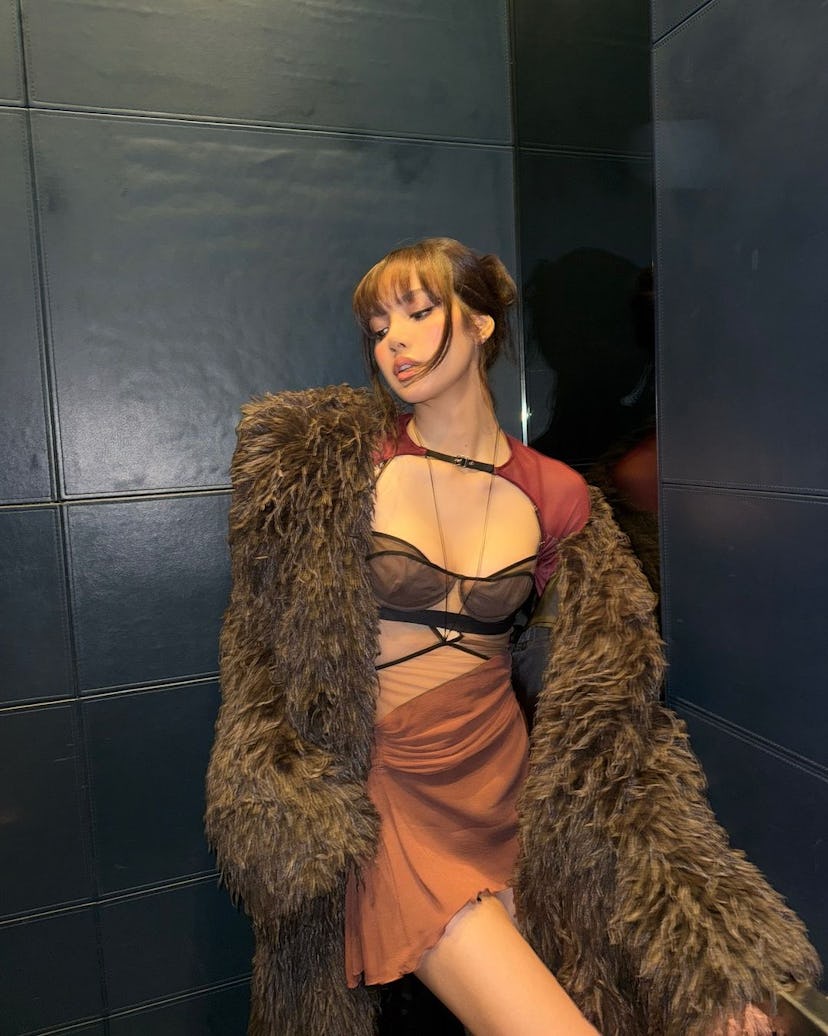Lisa in a Nensi Dojaka dress.