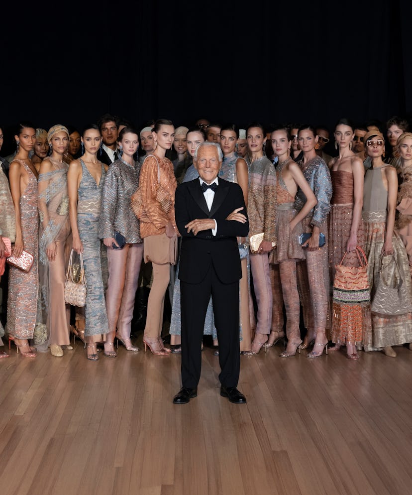 Giorgio Armani with models