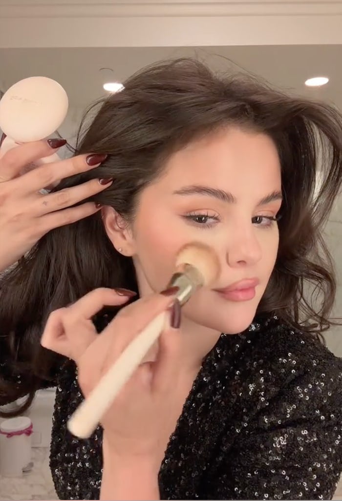 Selena Gomez in burgundy nails.