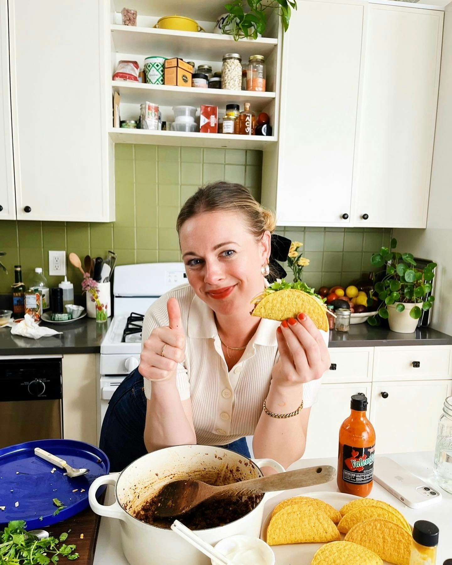 Alison Roman cooking at home.