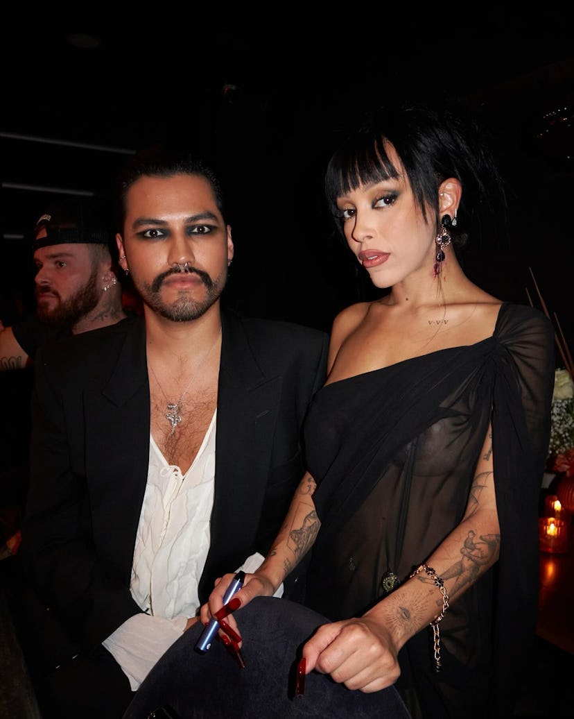 Doja Cat freed the nip and wore the stringiest G-string ever strung.