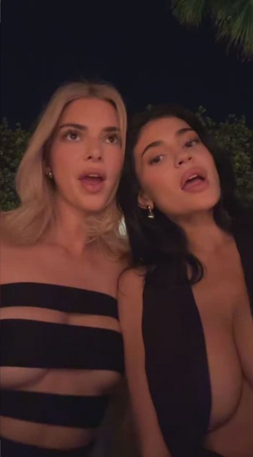 Kendall and Kylie Jenner wear matching cutout LBDs.