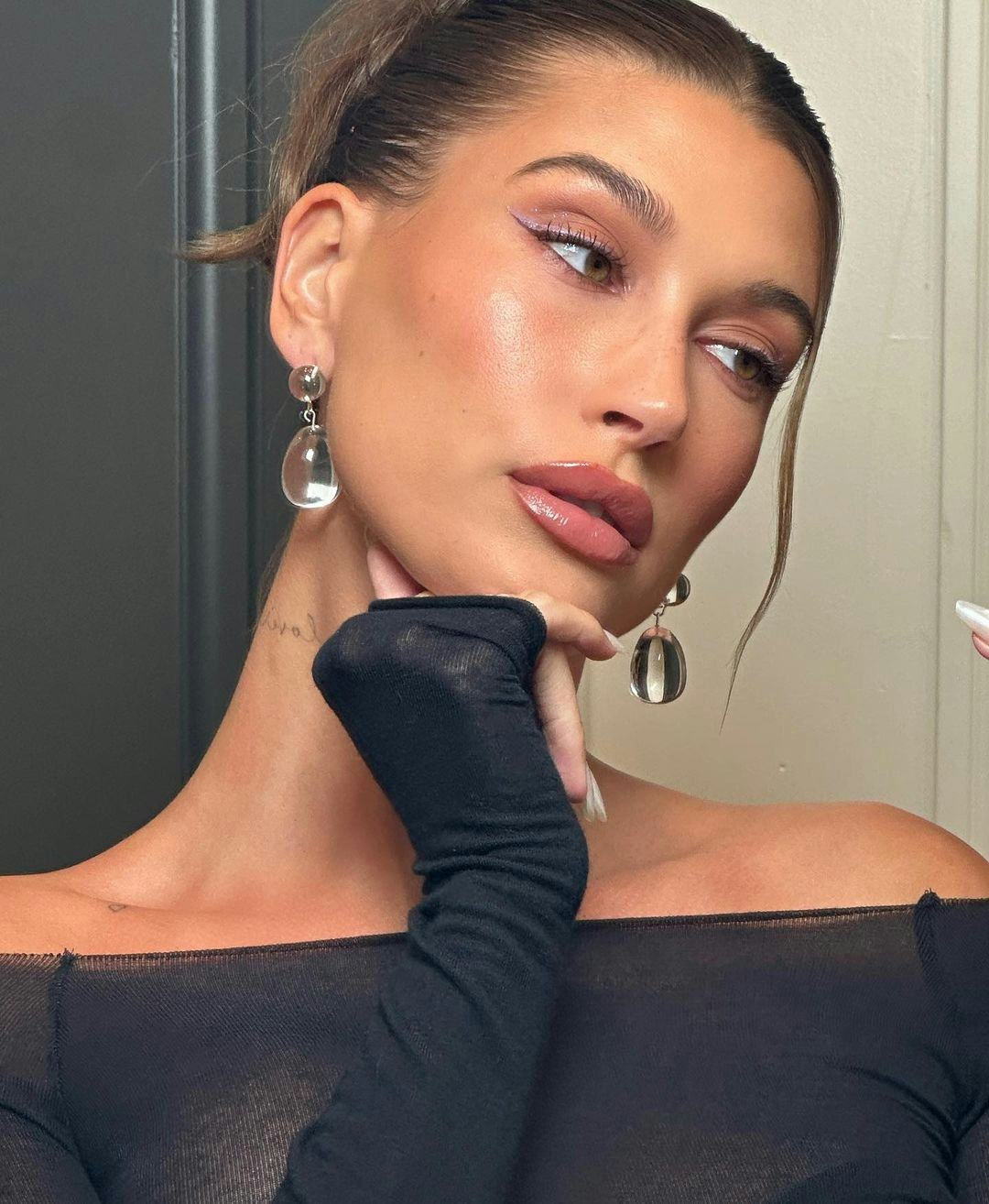 Hailey Bieber's latest dark chocolate manicure is fall-time perfection.