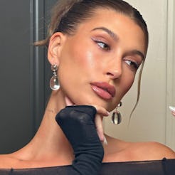 Hailey Bieber's latest dark chocolate manicure is fall-time perfection.