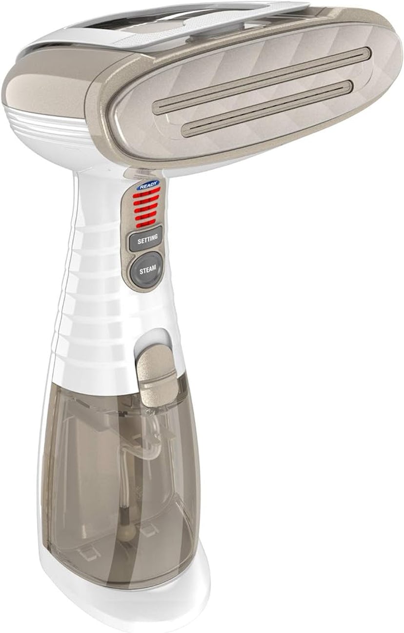 A handheld garment steamer with a sleek white and gold design, featuring a steam nozzle, control but...