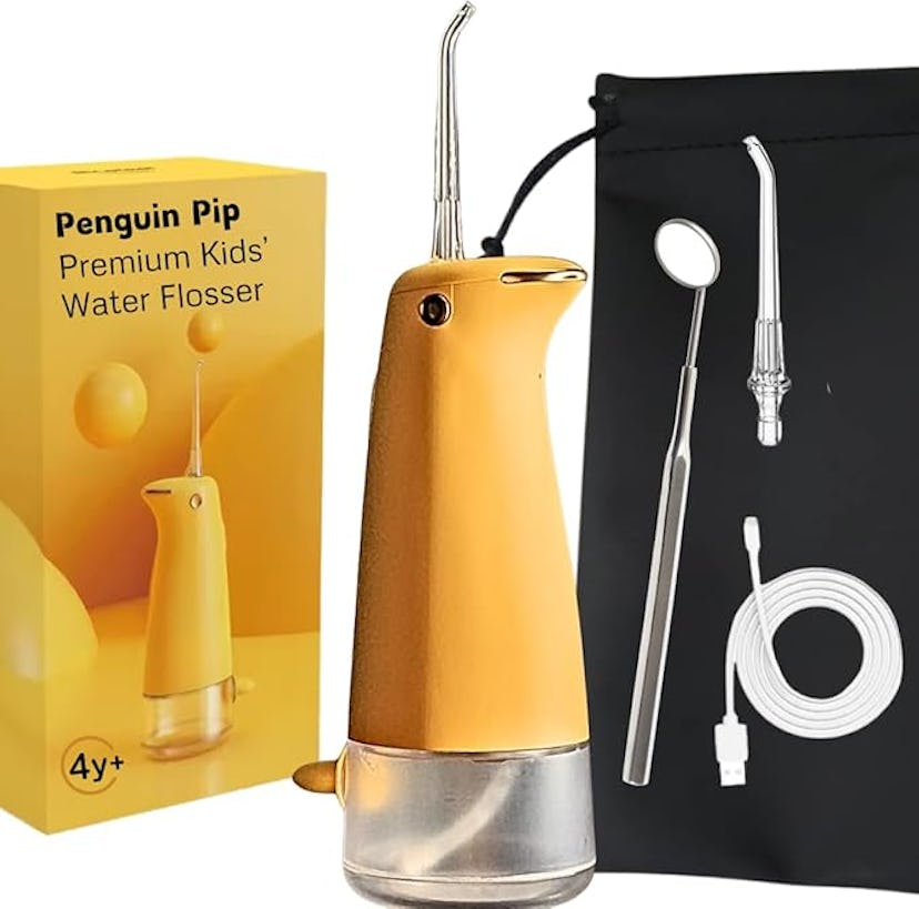 A yellow penguin-shaped water flosser for kids, alongside a black pouch containing additional access...