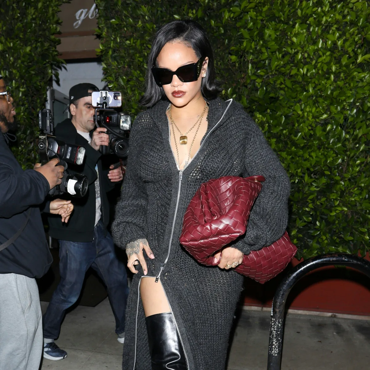 Rihanna Embraces Sweater Weather In a Knit Maxi Dress and Thigh-High Boots Rihanna Embraces Sweater Weather In a Knit Maxi Dress and Thigh-High Boots