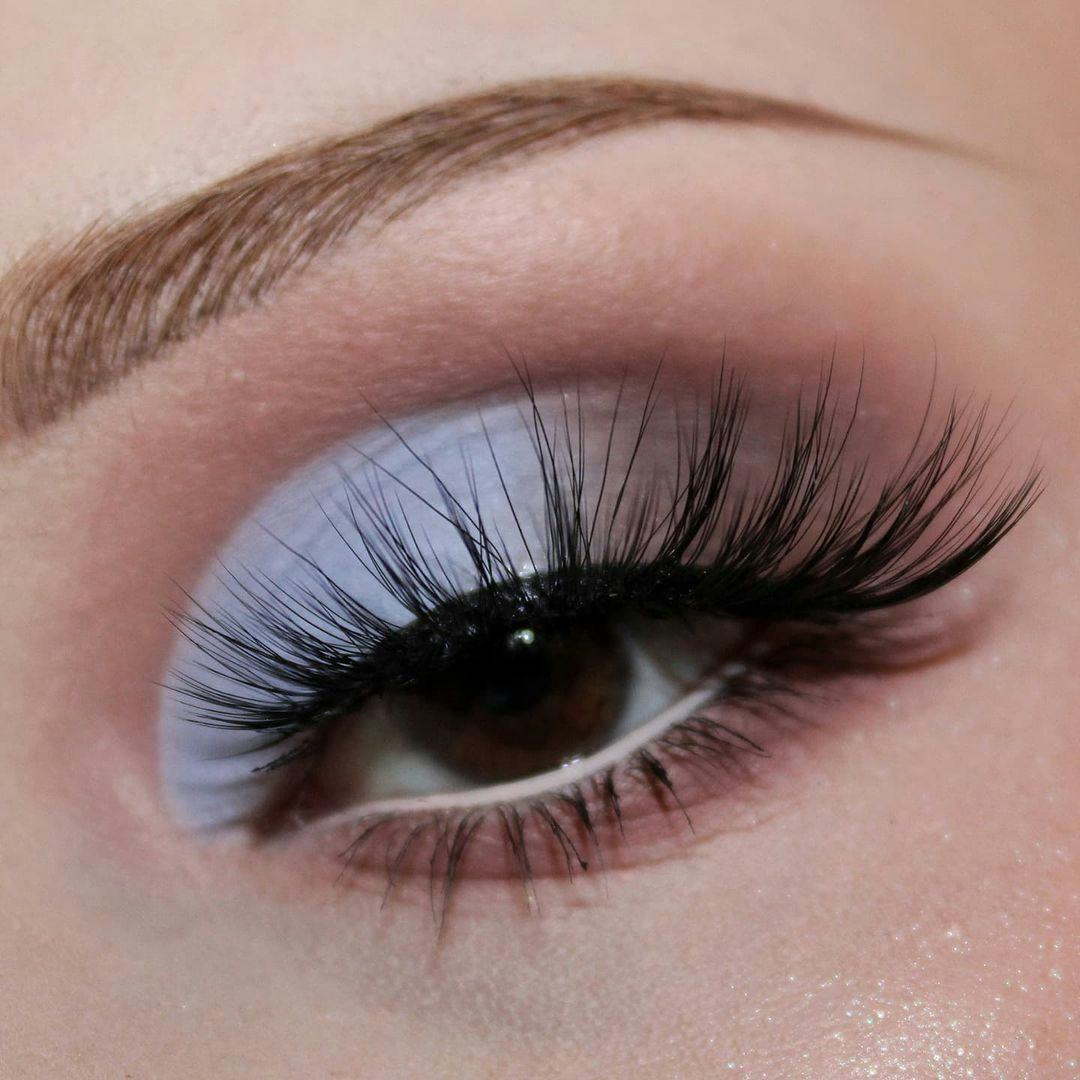 Feathery eyelashes are on-trend for winter 2025.