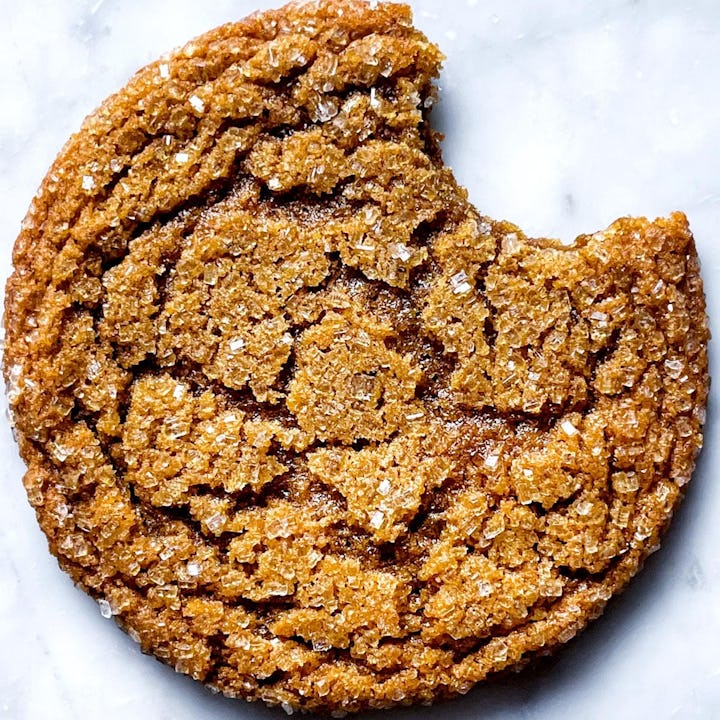 Chewy ginger cookie on a white marble background, a delicious fall cookie recipe