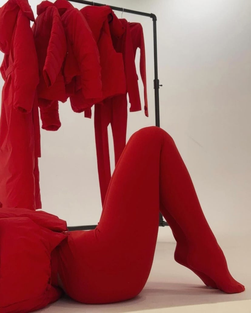 Kylie Jenner channeled Blair Waldorf wearing bright red tights and the viral Khy Puffer Jacket