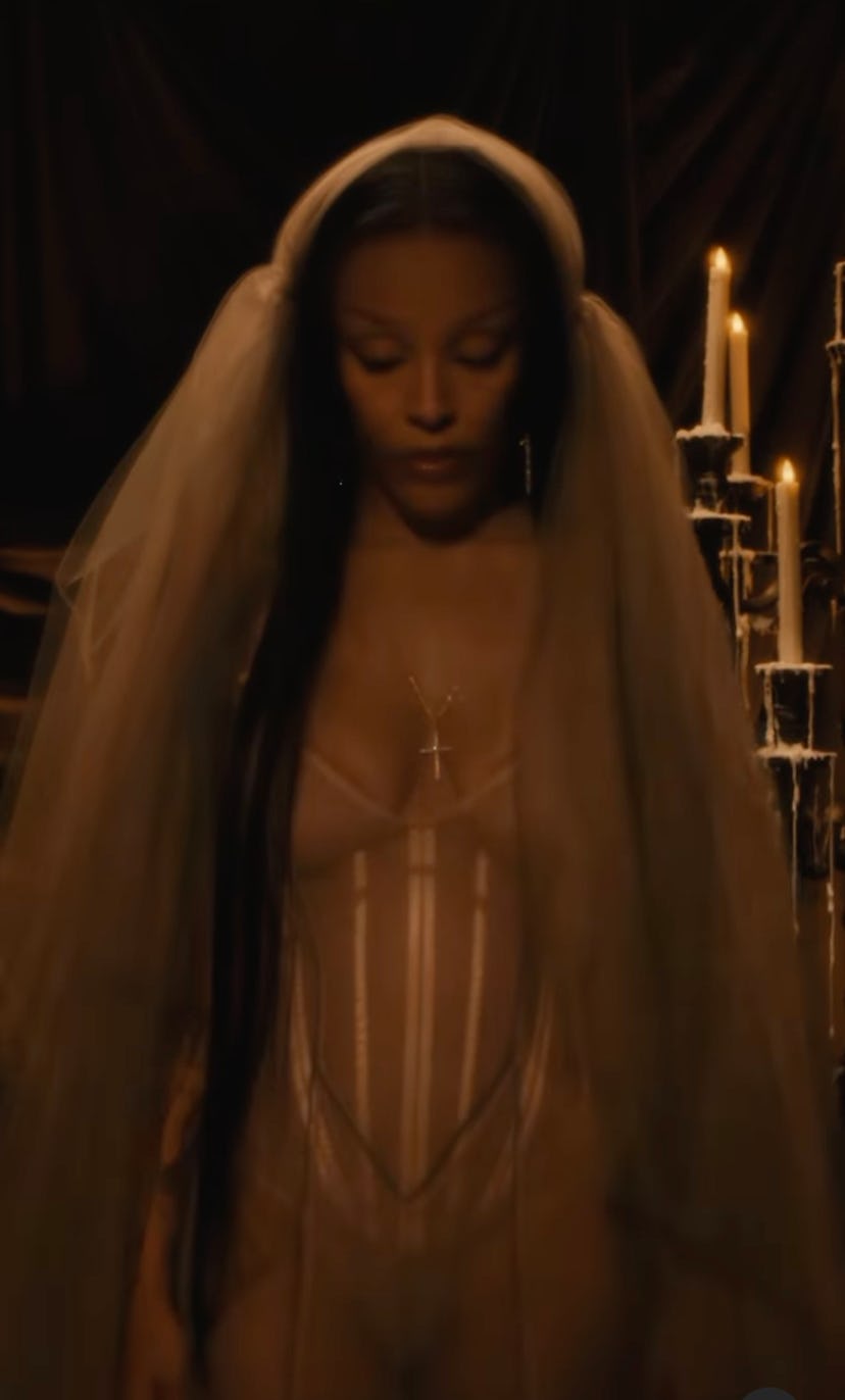 Doja Cat wears a sheer bustier dress.  