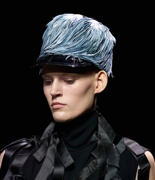 Model in Prada hat