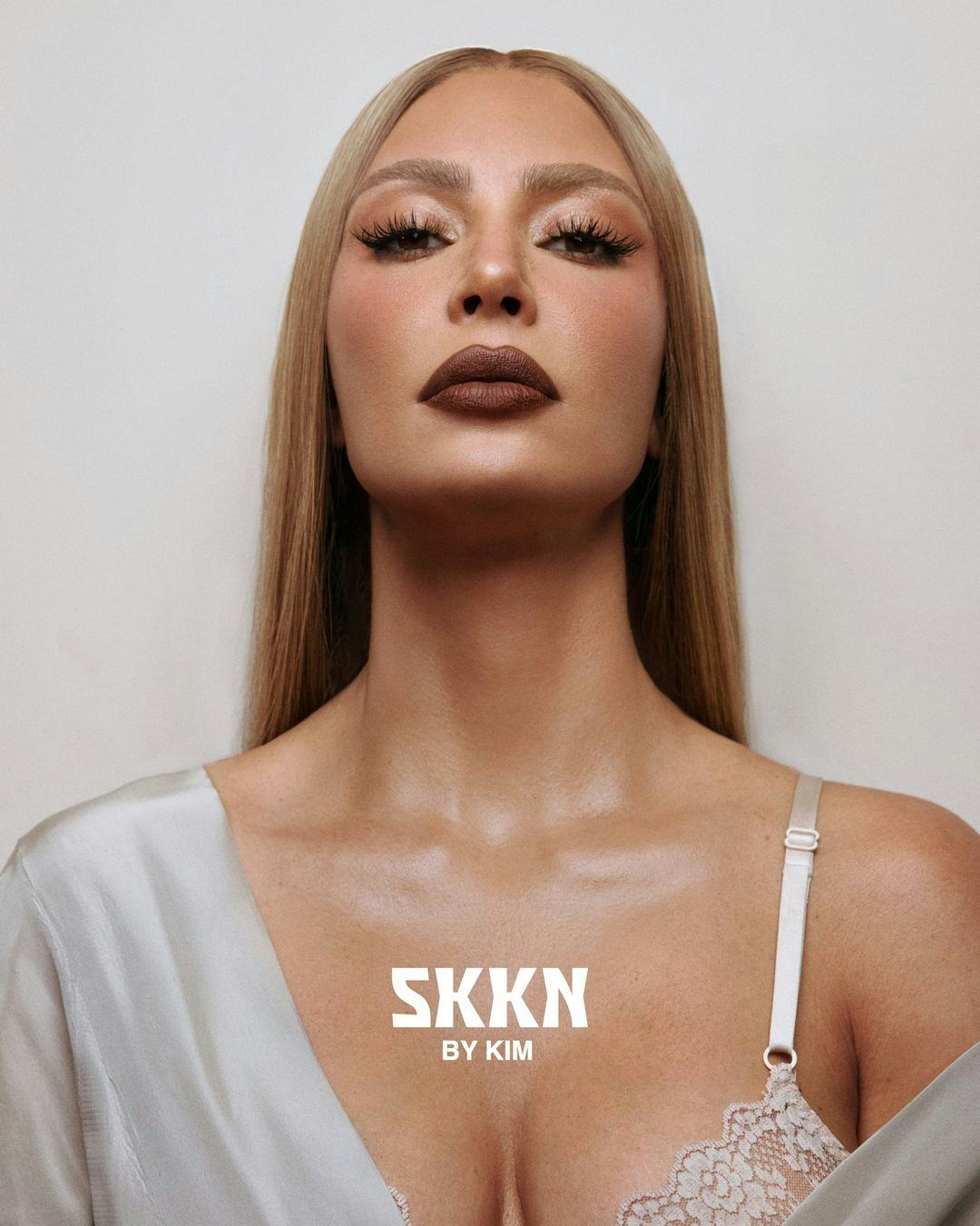 Kim Kardashian exposed her bra in a new SKKN BY KIM campaign.