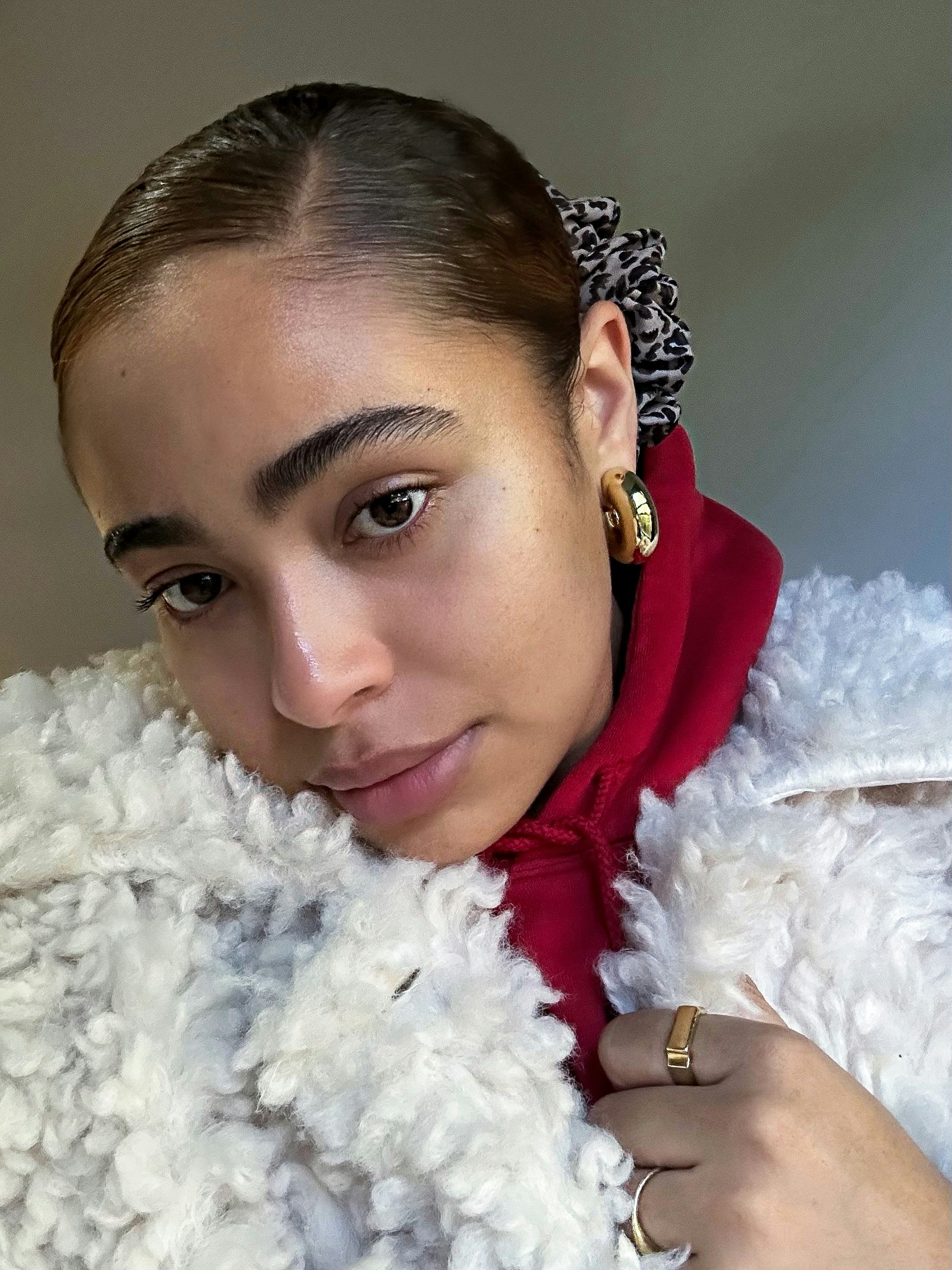 TRESemmé&rsquo;s Extra Hold Hairspray is perfect for my slicked-back bun.