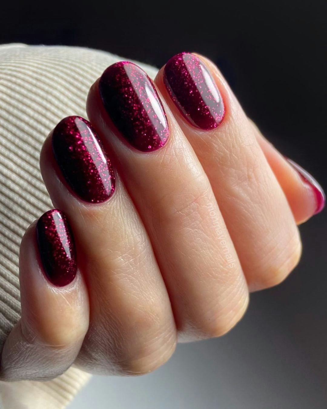 A garnet-inspired manicure is perfect for Capricorns