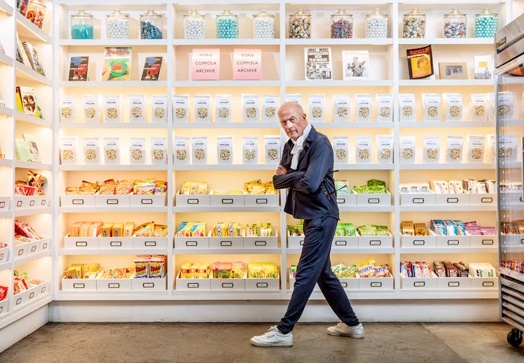 Jacques Audiard wears his own clothing, scarf, and sneakers; Akoni Eyewear sunglasses.