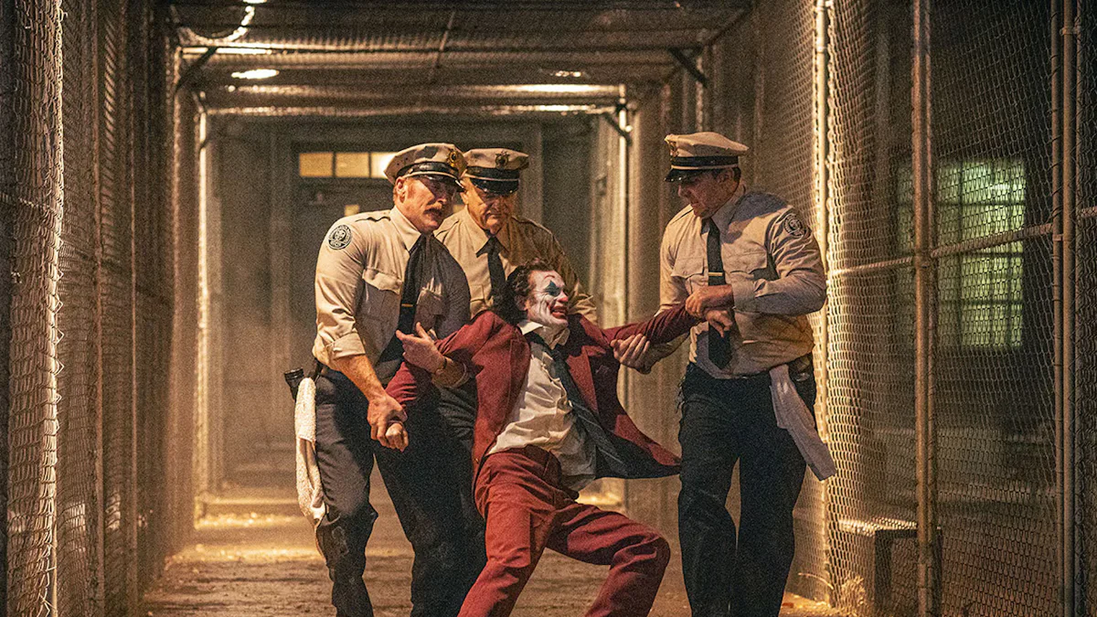 joker cigarette vs cops Joker: Folie Deux Behind the Scenes | Can I Have a Cigarette? | Warner Bros. Entertainment Arthur in police car |