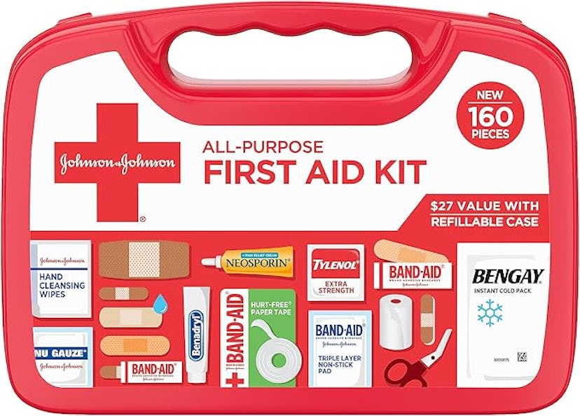 A red first aid kit labeled "Johnson & Johnson All-Purpose First Aid Kit" containing various medical...