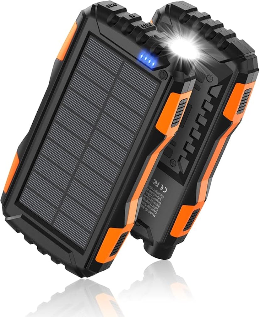 A rugged solar power bank with a textured black and orange design featuring solar panels and a built...