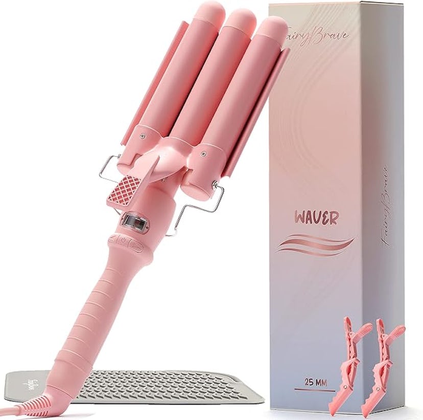 A pink three-barrel curling wand is shown alongside its box labeled "Waver." The set includes two ha...