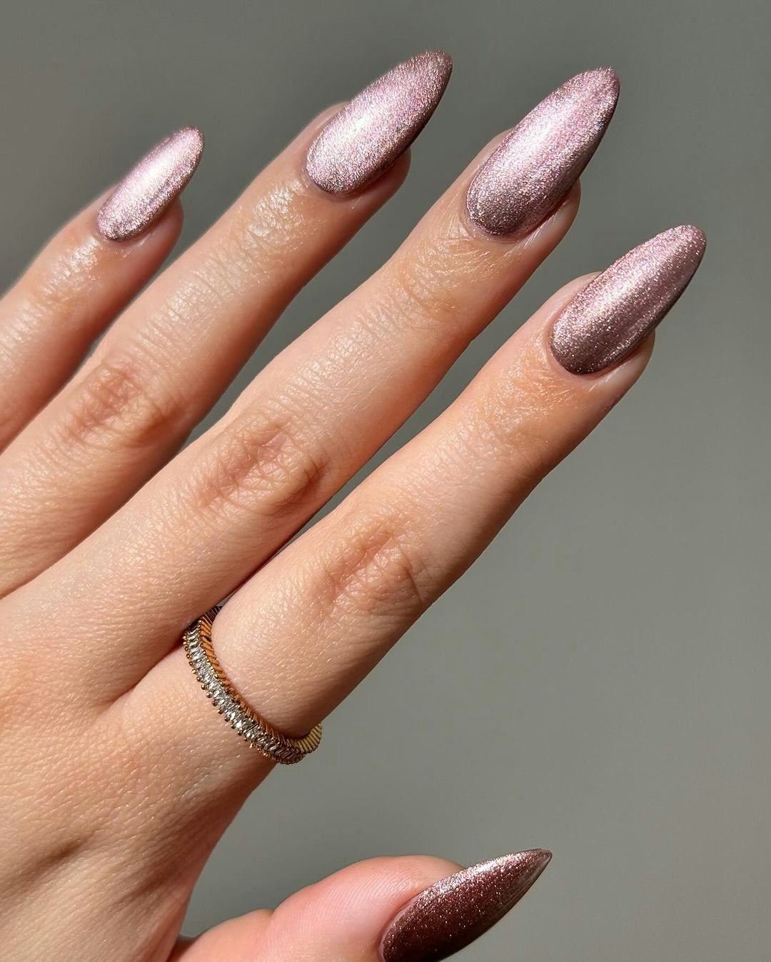 Shimmering mauve nails are on-trend for fall 2024.