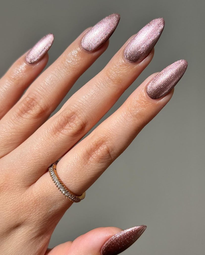 Shimmering mauve nails are on-trend for fall 2024.