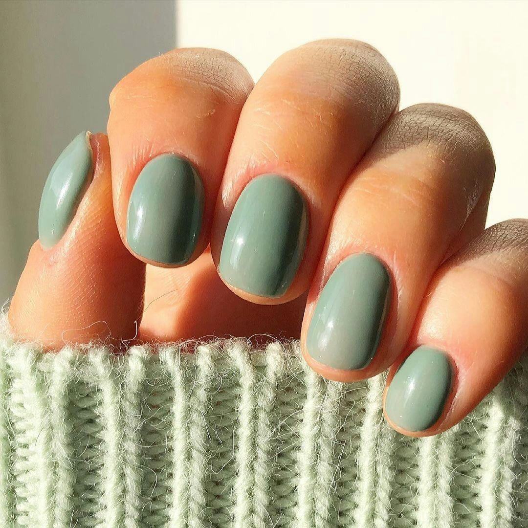 Sage green polish is on-trend for fall 2024.