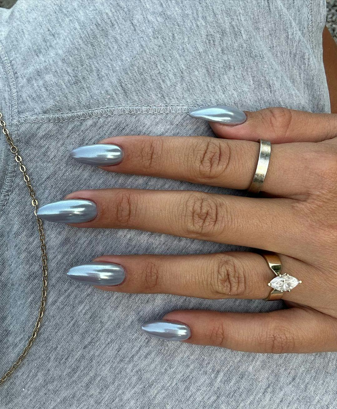 Dove gray chrome nails are on-trend for fall 2024.