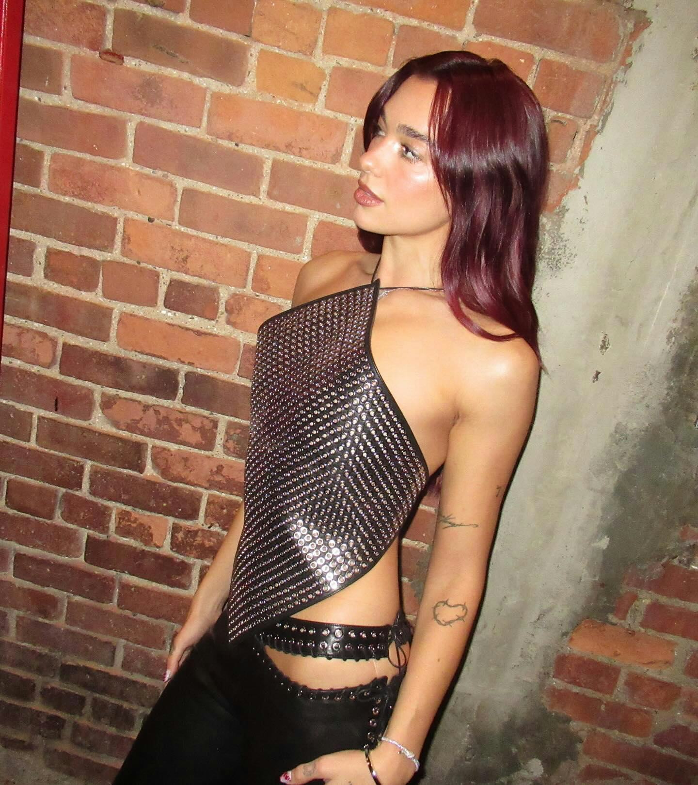 Dua Lipa&rsquo;s Y2K outfit featured a whale tail and grommets.