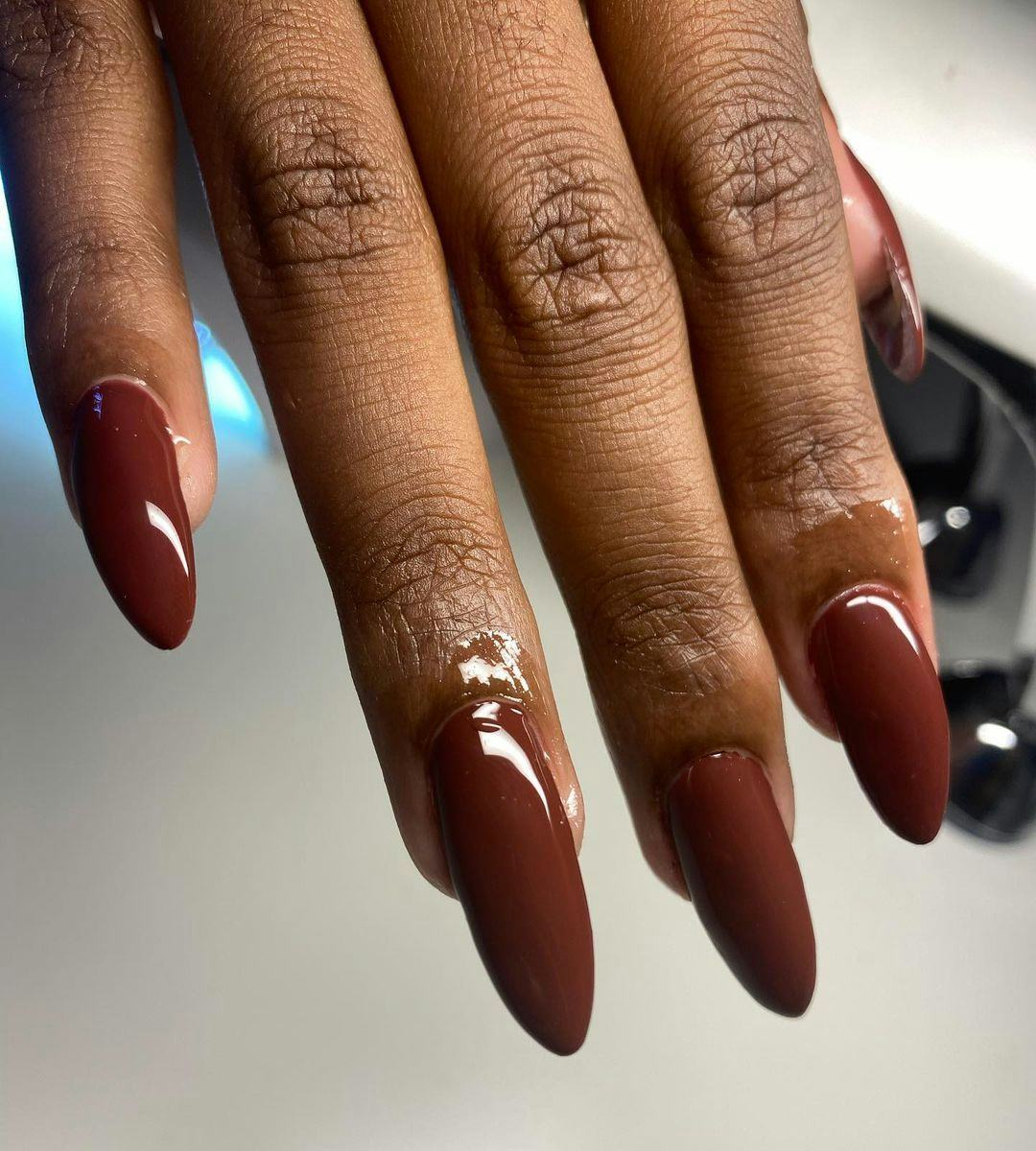 Burnt maple polish colors are on-trend for fall 2024.