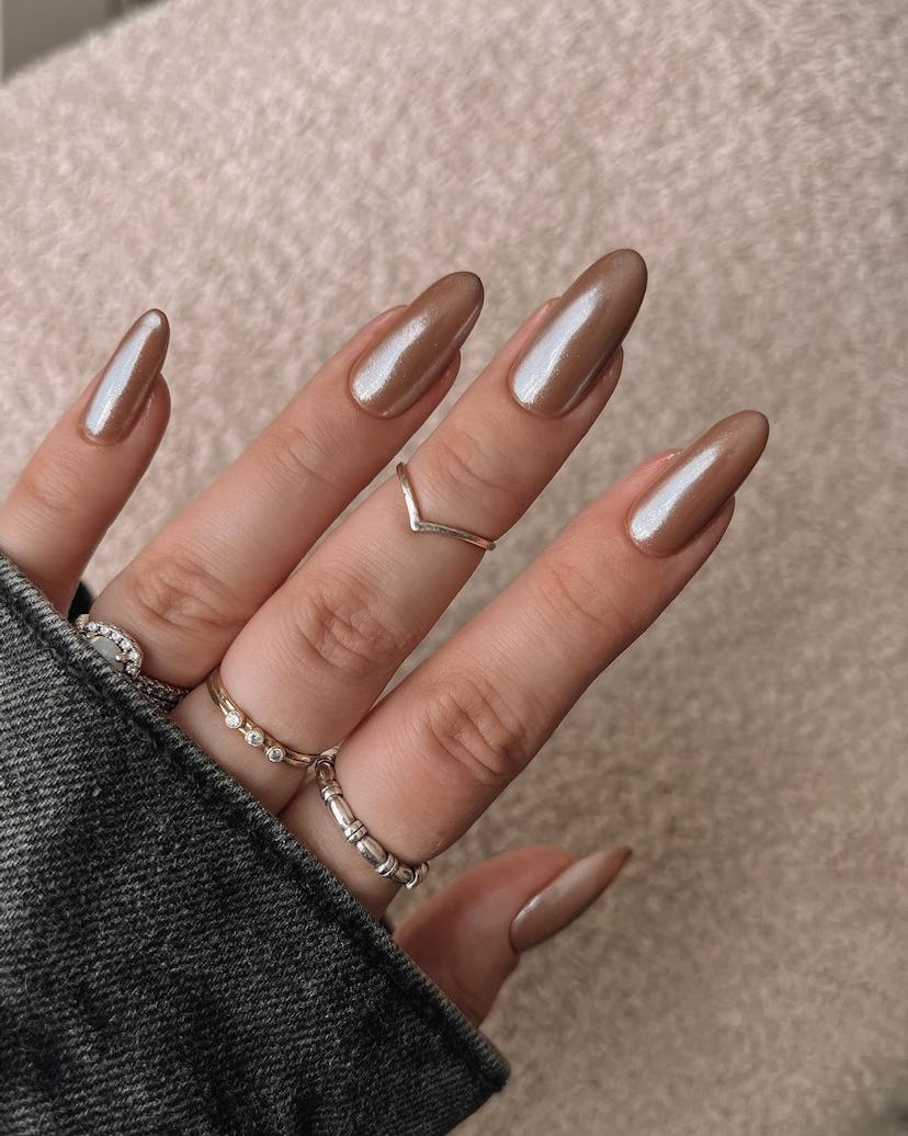 Light cocoa glazed nails are on-trend for fall 2024.
