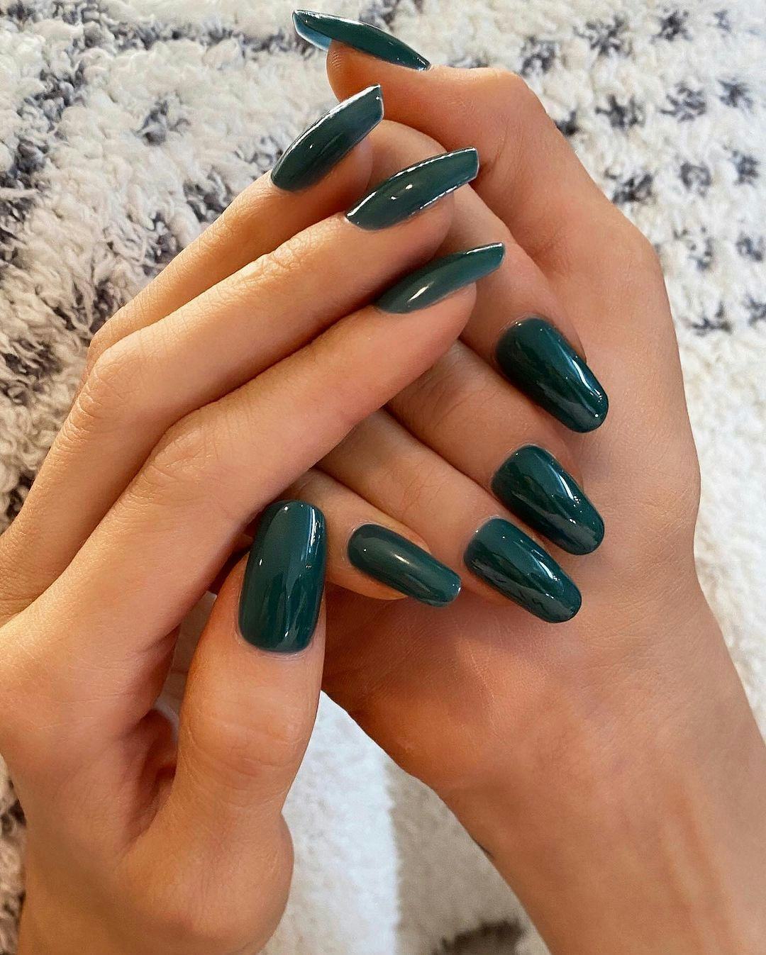 Emerald green polish is on-trend for fall 2024.