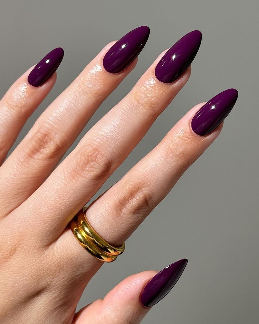 Dark berry polish is on-trend for fall 2024.
